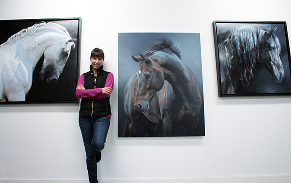 Anne-Marie Kornachuk with some of her recent horse portraits